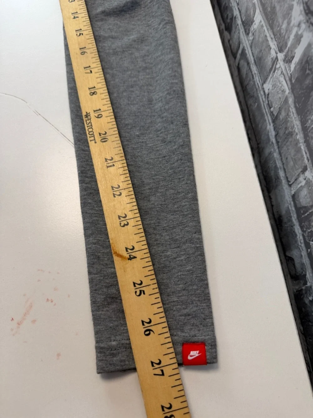 Nike Gray Athletic Leggings with Bold Black Graphic